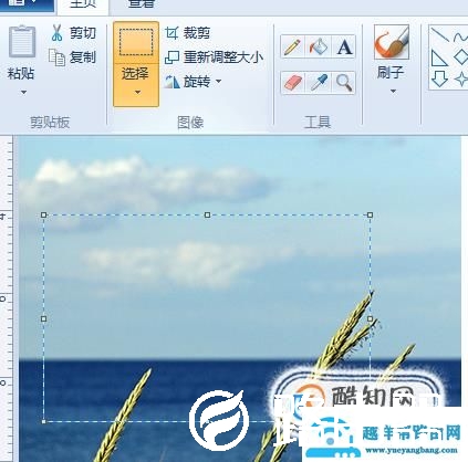 怎么使用画图把相片调整成2寸？